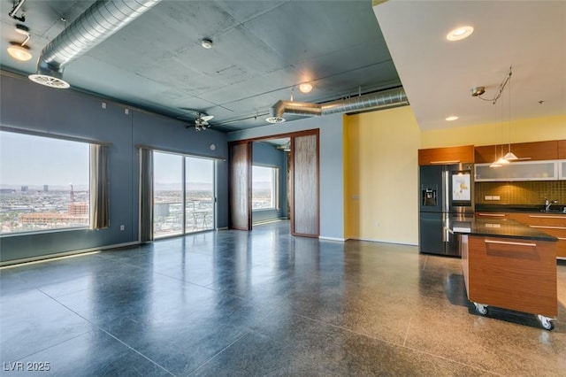 900 Las Vegas Blvd Unit 1209, Las Vegas, NV 89101 - interior space with baseboards, a ceiling fan, and light aggregate flooring