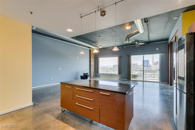 900 Las Vegas Blvd Unit 1209, Las Vegas, NV 89101 - kitchen featuring smart refrigerator, brown cabinetry, modern cabinets, baseboards, and open floor plan