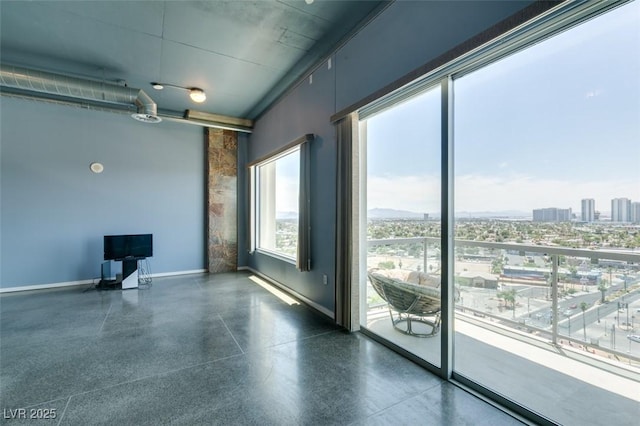 900 Las Vegas Blvd Unit 1209, Las Vegas, NV 89101 - empty room with baseboards, speckled floor, and a city view