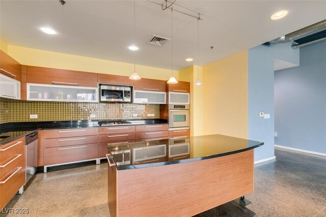 900 Las Vegas Blvd Unit 1209, Las Vegas, NV 89101 - kitchen featuring appliances with stainless steel finishes, modern cabinets, dark countertops, and recessed lighting
