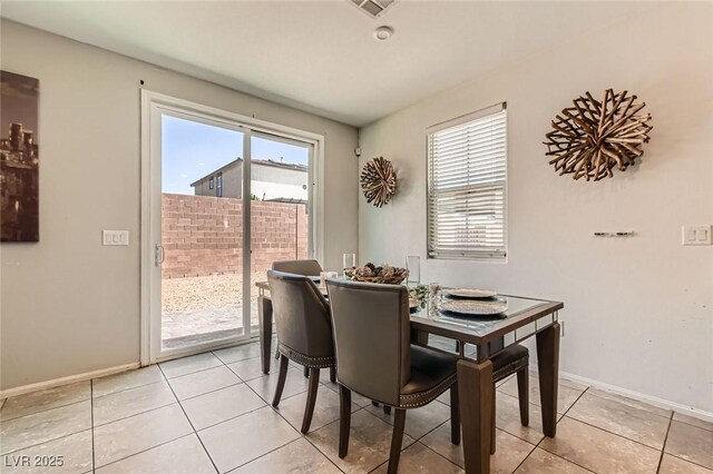 3716 W Colton Ave, North Las Vegas, NV 89032 - dining space with baseboards and light tile patterned floors