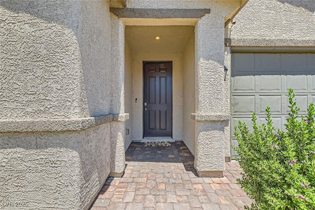 3716 W Colton Ave, North Las Vegas, NV 89032 - entrance to property with stucco siding and an attached garage