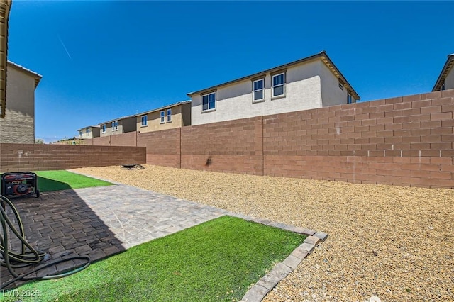 3716 W Colton Ave, North Las Vegas, NV 89032 - fenced backyard with a patio