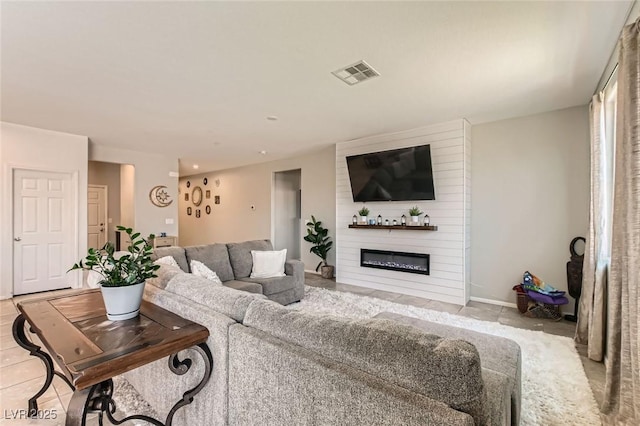 3716 W Colton Ave, North Las Vegas, NV 89032 - living area with a fireplace and baseboards