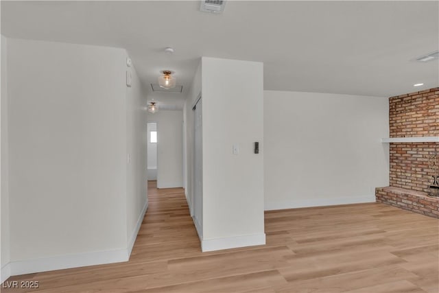 6204 Robin Hood Cir, Las Vegas, NV 89108 - hallway with light wood-style floors and baseboards