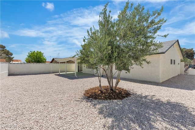 6204 Robin Hood Cir, Las Vegas, NV 89108 - back of house with a patio and stucco siding