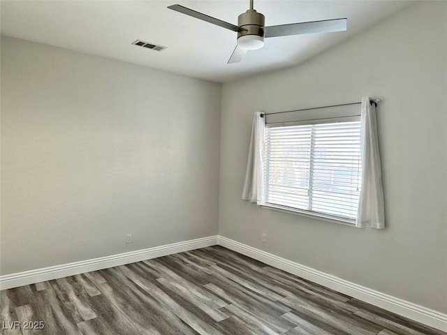 8931 Lansberry Ct, Las Vegas, NV 89147 - spare room featuring dark wood-style flooring, baseboards, and a ceiling fan
