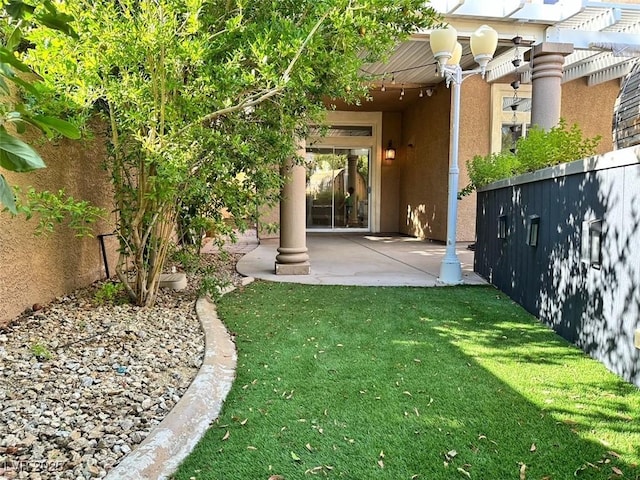 8931 Lansberry Ct, Las Vegas, NV 89147 - view of yard featuring a patio area