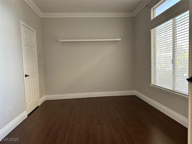 8931 Lansberry Ct, Las Vegas, NV 89147 - empty room with dark wood-style flooring, ornamental molding, and baseboards