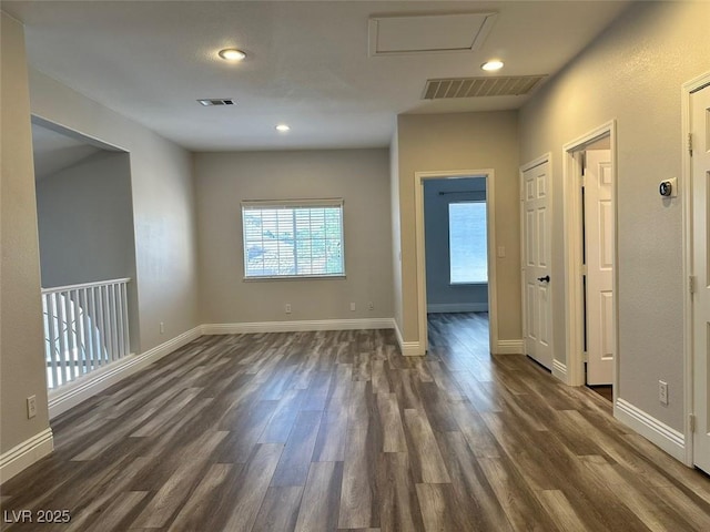 8931 Lansberry Ct, Las Vegas, NV 89147 - empty room with dark wood finished floors, recessed lighting, and baseboards