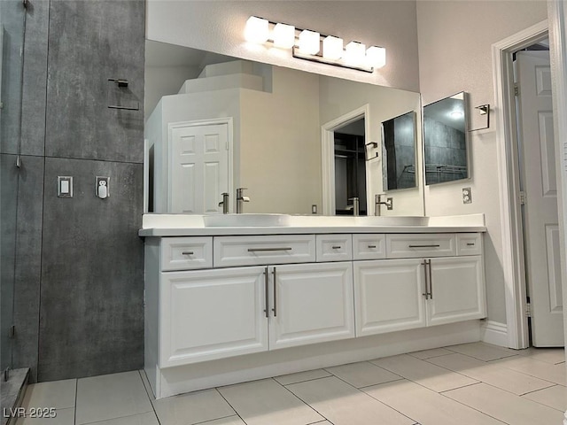 8931 Lansberry Ct, Las Vegas, NV 89147 - bathroom featuring double vanity, tile patterned flooring, and a shower