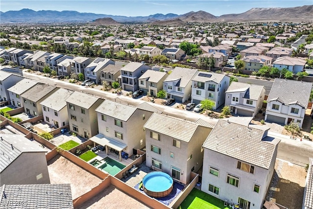 5904 Becklow Gardens Ave, Las Vegas, NV 89141 - aerial view of residential area with a pool area and mountains