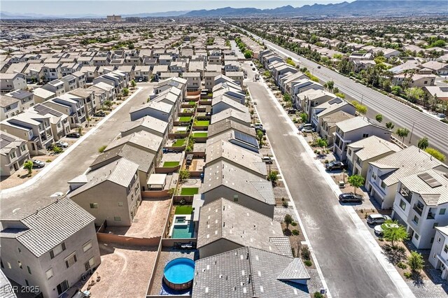 5904 Becklow Gardens Ave, Las Vegas, NV 89141 - aerial perspective of suburban area featuring a mountain backdrop