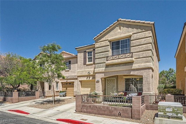 10456 Prairie Schooner Ave, Las Vegas, NV 89129 - view of front of house featuring a tiled roof, driveway, a garage, and stucco siding