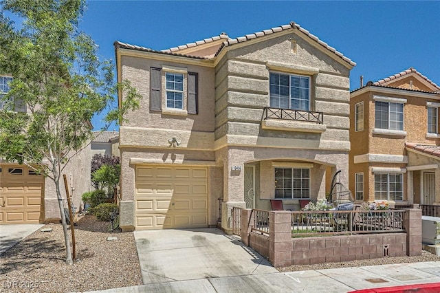 10456 Prairie Schooner Ave, Las Vegas, NV 89129 - view of front of house featuring concrete driveway, an attached garage, a tile roof, and stucco siding