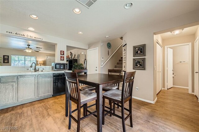 10456 Prairie Schooner Ave, Las Vegas, NV 89129 - dining space with a ceiling fan, stairs, recessed lighting, light wood-type flooring, and baseboards