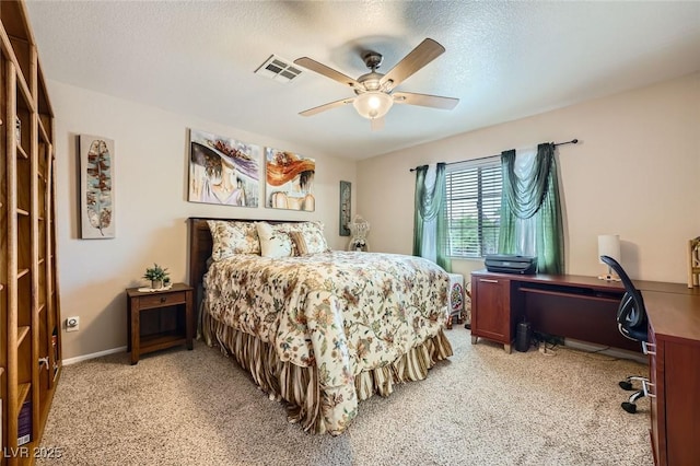 10456 Prairie Schooner Ave, Las Vegas, NV 89129 - bedroom featuring light carpet, an office area, a ceiling fan, and a textured ceiling