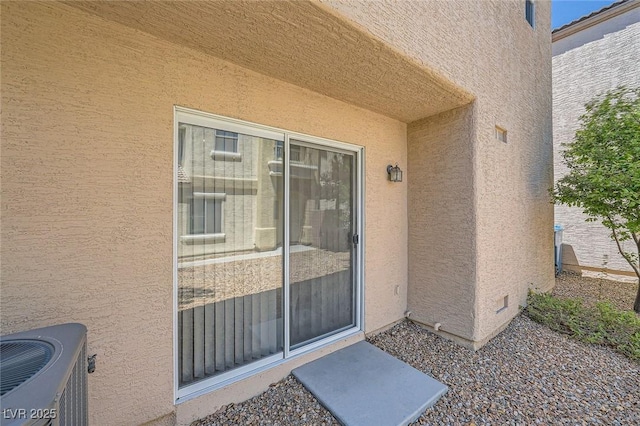 10456 Prairie Schooner Ave, Las Vegas, NV 89129 - doorway to property featuring stucco siding