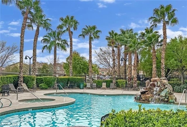 10456 Prairie Schooner Ave, Las Vegas, NV 89129 - community pool with a community hot tub and a patio area
