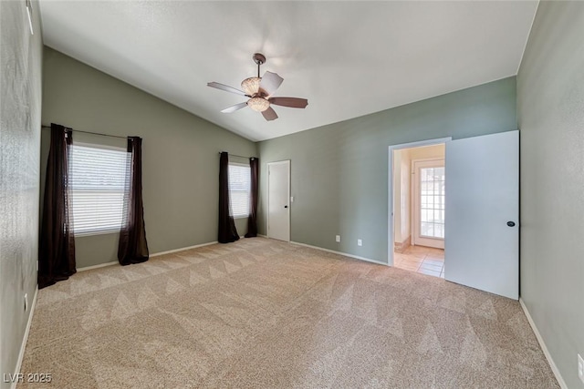 234 Geronimo Ct, Henderson, NV 89074 - spare room featuring a ceiling fan, light carpet, and vaulted ceiling