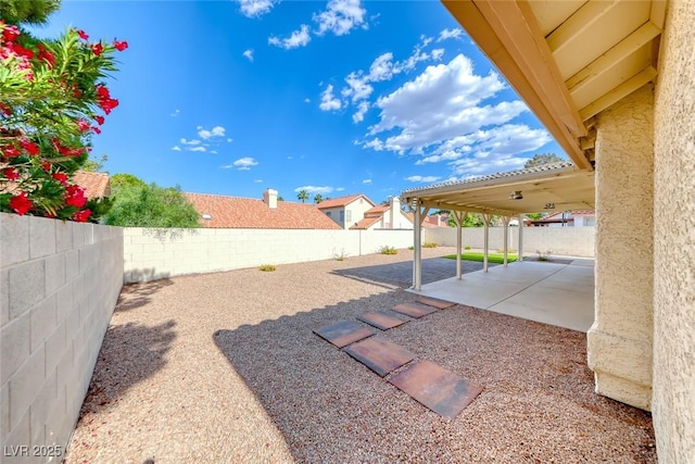 234 Geronimo Ct, Henderson, NV 89074 - fenced backyard with a patio area