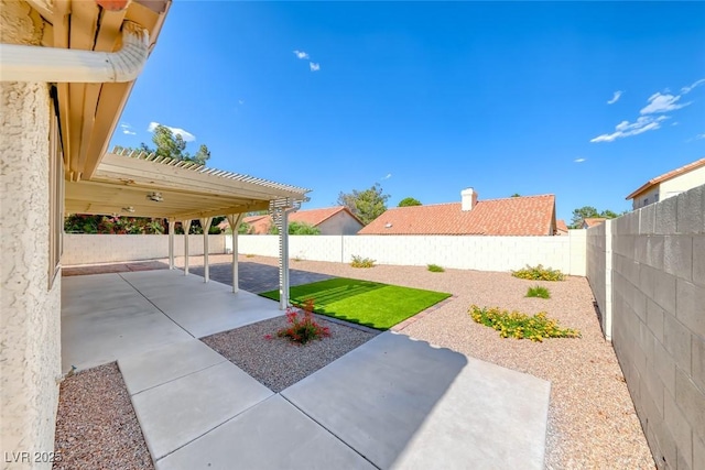 234 Geronimo Ct, Henderson, NV 89074 - fenced backyard with a patio