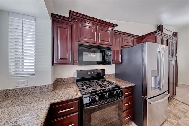 234 Geronimo Ct, Henderson, NV 89074 - kitchen featuring black appliances, dark brown cabinets, light carpet, and light stone countertops