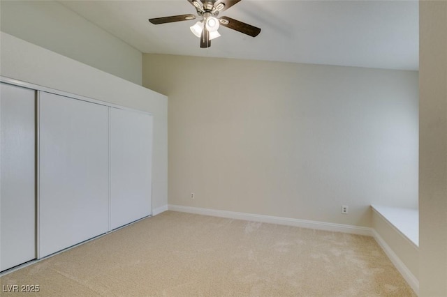 2251 Wigwam Pkwy Unit 824, Henderson, NV 89074 - unfurnished bedroom with light colored carpet, a closet, baseboards, and vaulted ceiling