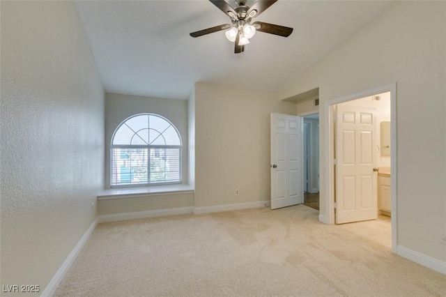 2251 Wigwam Pkwy Unit 824, Henderson, NV 89074 - unfurnished bedroom featuring carpet flooring, lofted ceiling, baseboards, ceiling fan, and ensuite bath