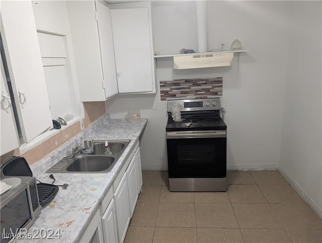 255 S 17th St, Las Vegas, NV 89101 - kitchen featuring appliances with stainless steel finishes, a sink, white cabinetry, and exhaust hood