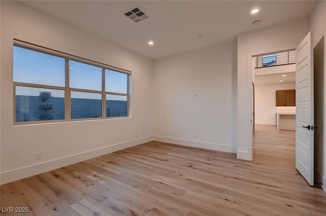 182 Robledo St, Las Vegas, NV 89138 - unfurnished room featuring baseboards, light wood-style floors, and recessed lighting