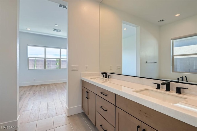 182 Robledo St, Las Vegas, NV 89138 - bathroom featuring healthy amount of natural light, double vanity, baseboards, recessed lighting, and tile patterned floors