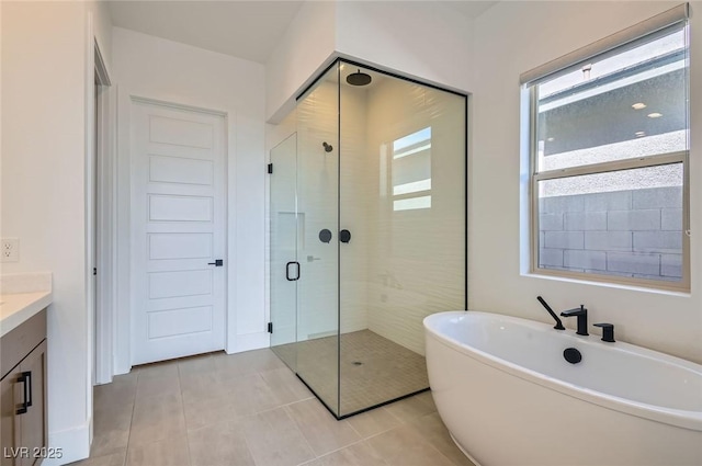 182 Robledo St, Las Vegas, NV 89138 - full bath featuring a shower stall, a freestanding bath, vanity, and tile patterned flooring
