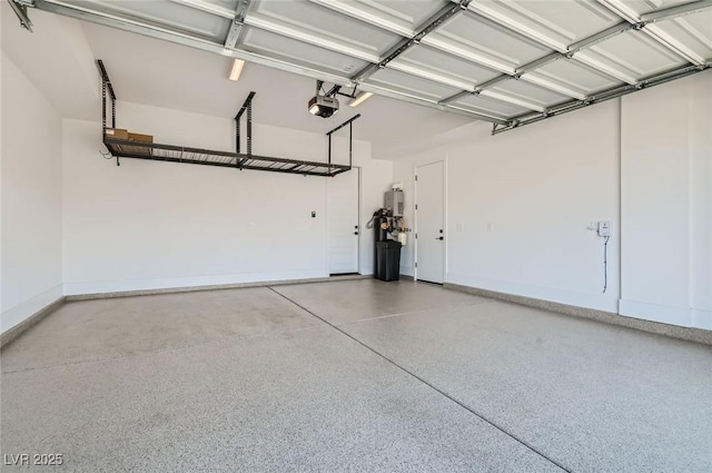 182 Robledo St, Las Vegas, NV 89138 - garage featuring a garage door opener and baseboards