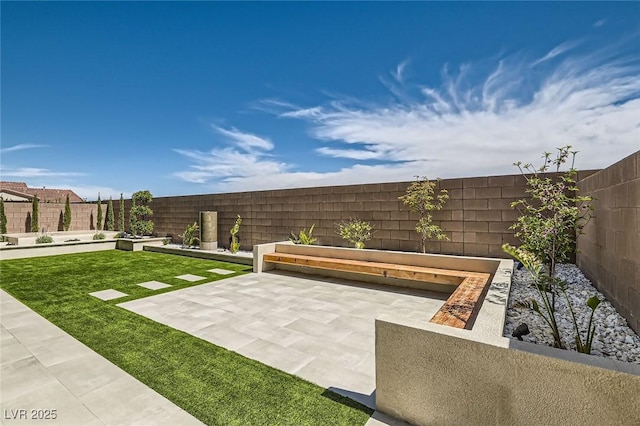 182 Robledo St, Las Vegas, NV 89138 - view of yard featuring a patio area and a vegetable garden