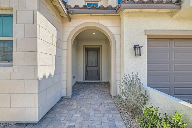 182 Robledo St, Las Vegas, NV 89138 - property entrance with stucco siding and a tile roof