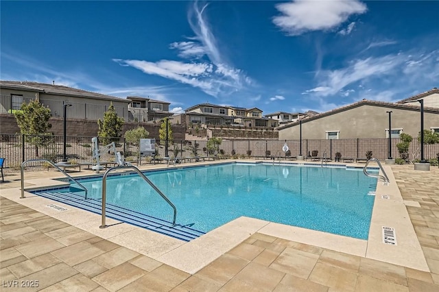 182 Robledo St, Las Vegas, NV 89138 - community pool with a patio area and a residential view
