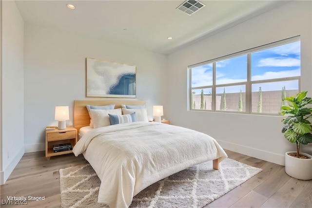 182 Robledo St, Las Vegas, NV 89138 - bedroom with baseboards, recessed lighting, and light wood finished floors
