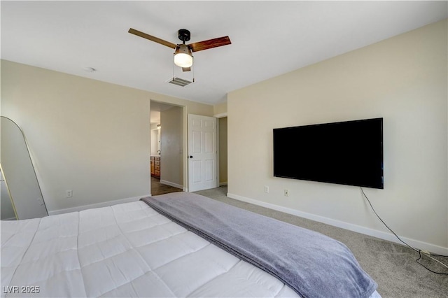 1952 W Hammer Ln, North Las Vegas, NV 89031 - carpeted bedroom featuring baseboards, ceiling fan, and connected bathroom