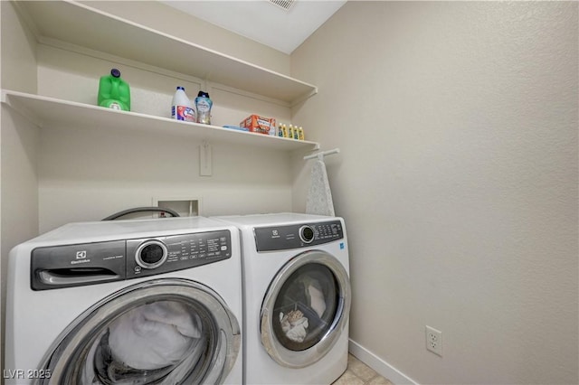 1952 W Hammer Ln, North Las Vegas, NV 89031 - laundry room featuring independent washer and dryer and baseboards