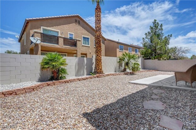 1952 W Hammer Ln, North Las Vegas, NV 89031 - fenced backyard featuring a patio area