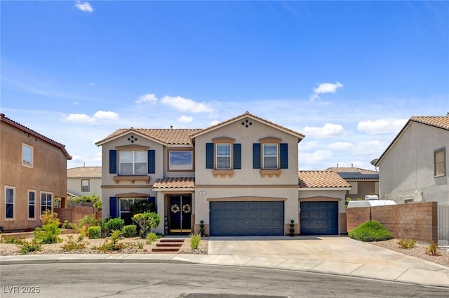 831 E Galingale Ct, Henderson, NV 89015 - mediterranean / spanish-style house with a tile roof, stucco siding, concrete driveway, and a garage