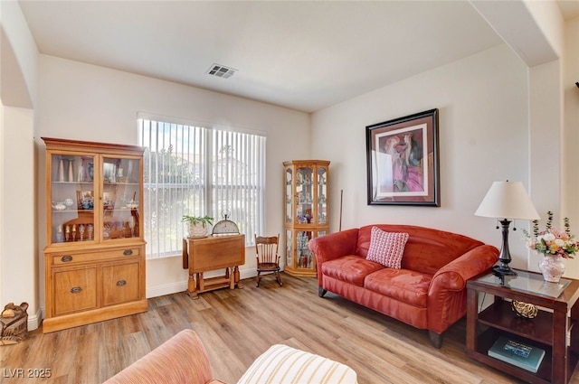 831 E Galingale Ct, Henderson, NV 89015 - living room with light wood finished floors and baseboards