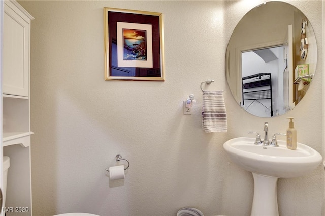 831 E Galingale Ct, Henderson, NV 89015 - half bathroom featuring toilet
