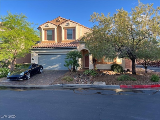 11625 Cabo Del Verde Ave, Las Vegas, NV 89138 - mediterranean / spanish-style home with driveway, an attached garage, stucco siding, and a tile roof