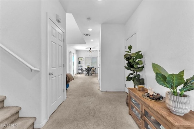 2837 Canonero St, Las Vegas, NV 89142 - corridor featuring stairway, recessed lighting, light carpet, and baseboards