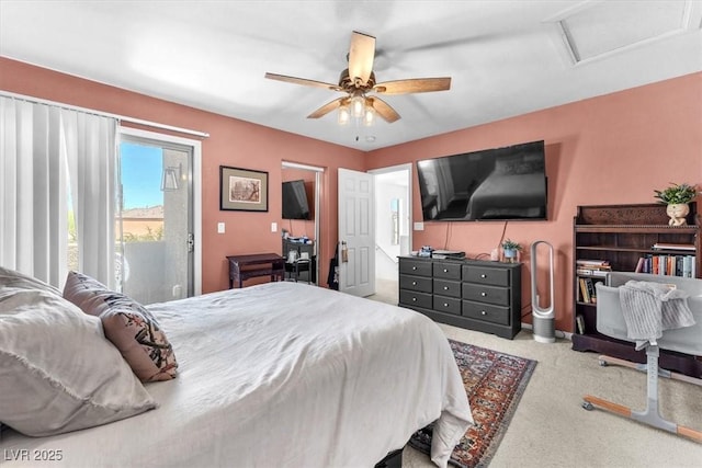 2837 Canonero St, Las Vegas, NV 89142 - bedroom with access to exterior, attic access, carpet, and a ceiling fan