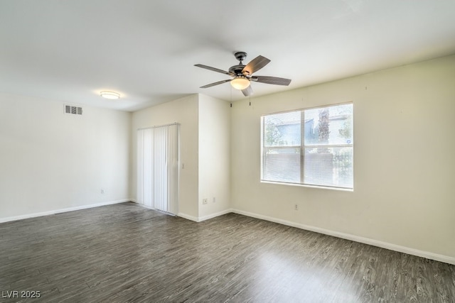 8000 Badura Ave Unit 1168, Las Vegas, NV 89113 - empty room featuring dark wood-type flooring, baseboards, and ceiling fan