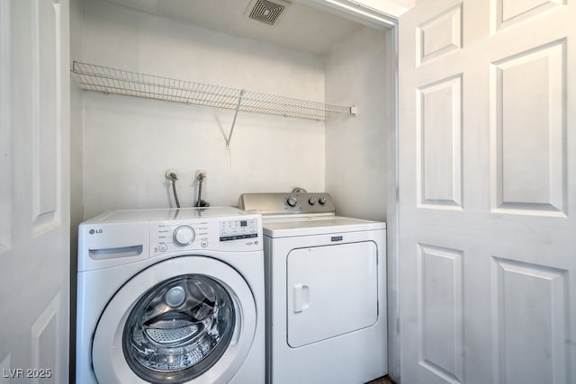 8000 Badura Ave Unit 1168, Las Vegas, NV 89113 - washroom with washing machine and dryer