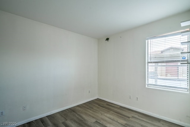 8000 Badura Ave Unit 1168, Las Vegas, NV 89113 - spare room featuring healthy amount of natural light, wood finished floors, and baseboards